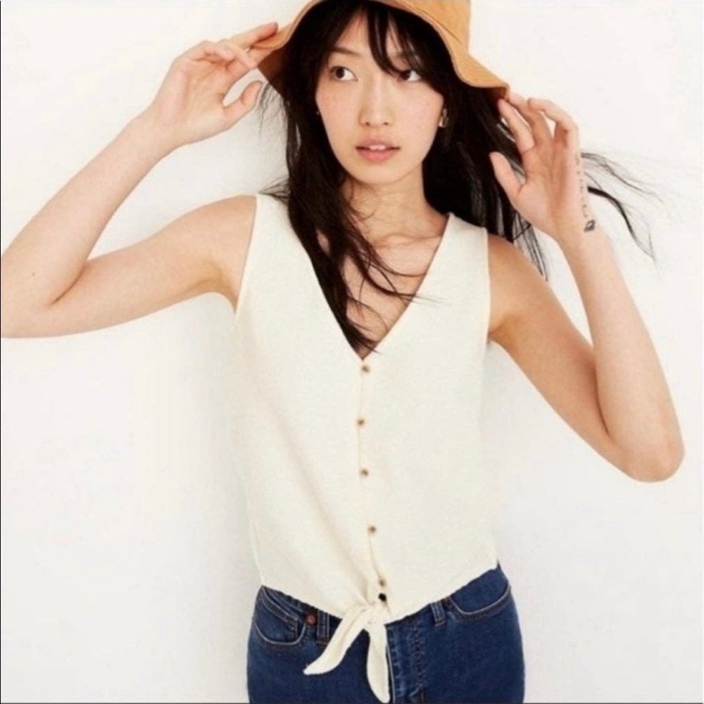 Texture and thread sleeveless top